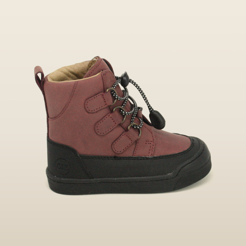 Berry Finn boot, side profile showing the toggle lacing and rubber toe cap