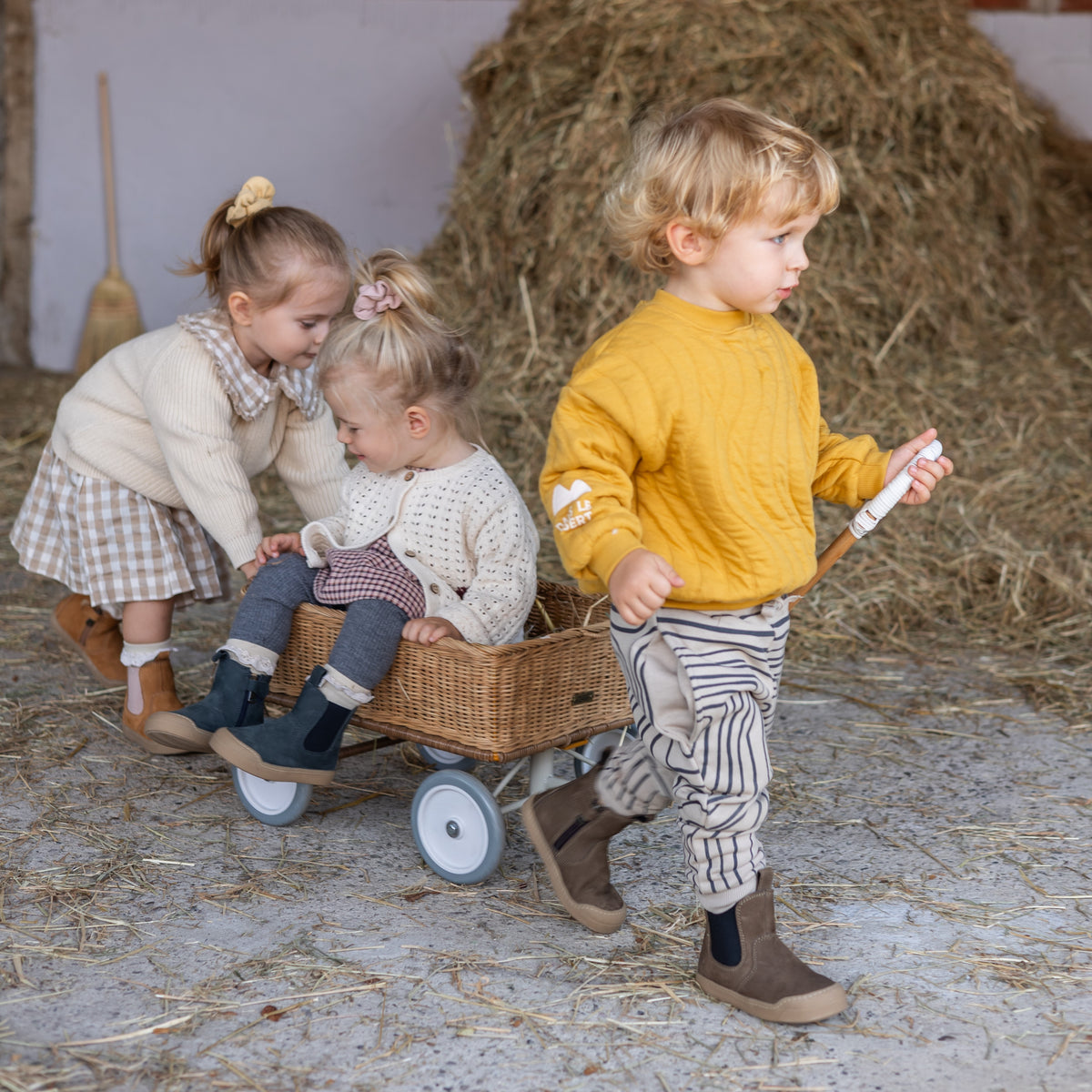 Toddler wearing the Winter Janne Bootie in brown