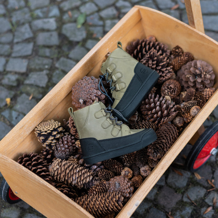 Detail of the khaki First Step Finn in wear