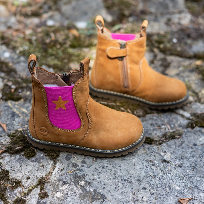 Camel winter Chelsea boots with a pink star panel on mossy stone